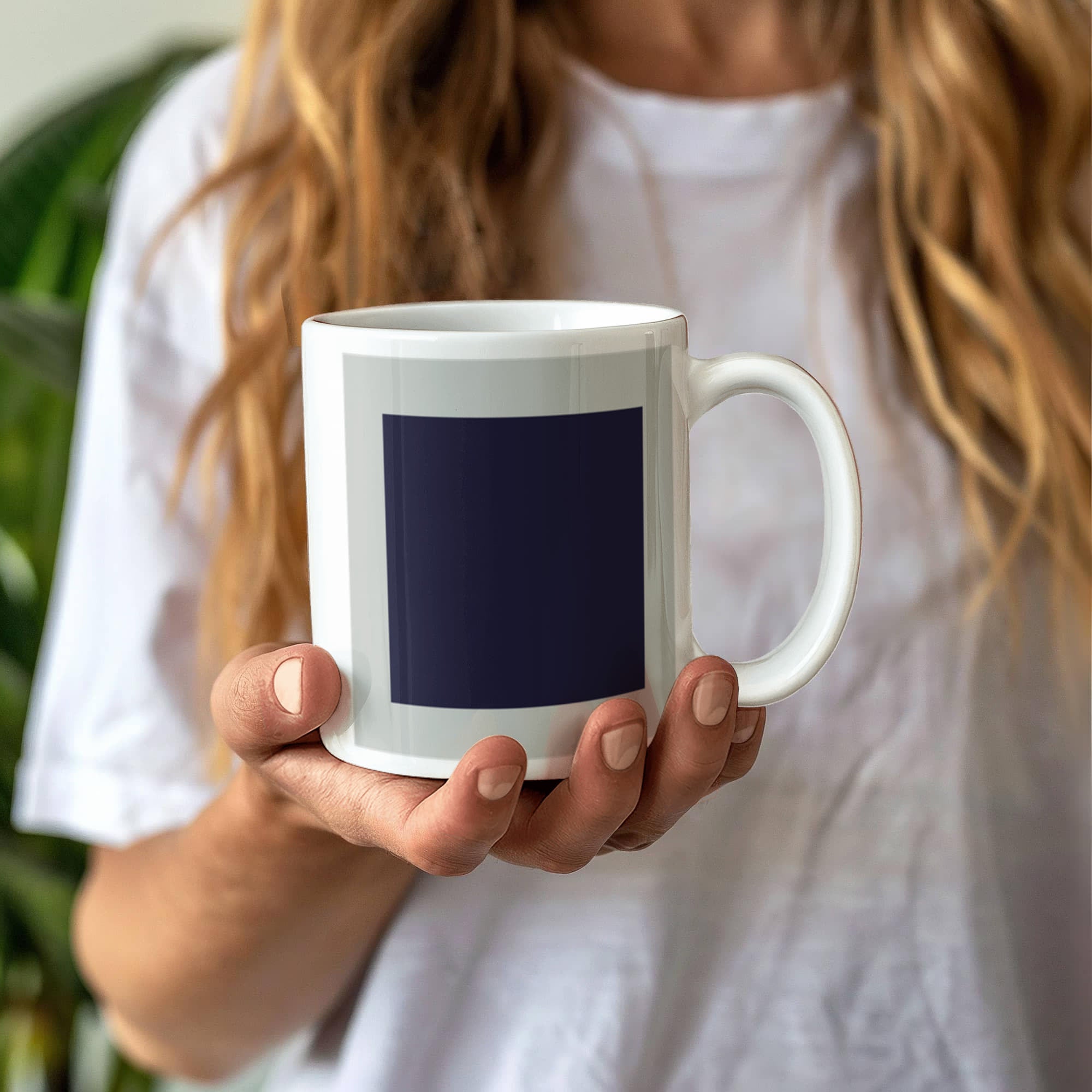 Black Suprematic Square (1915) on a white mug