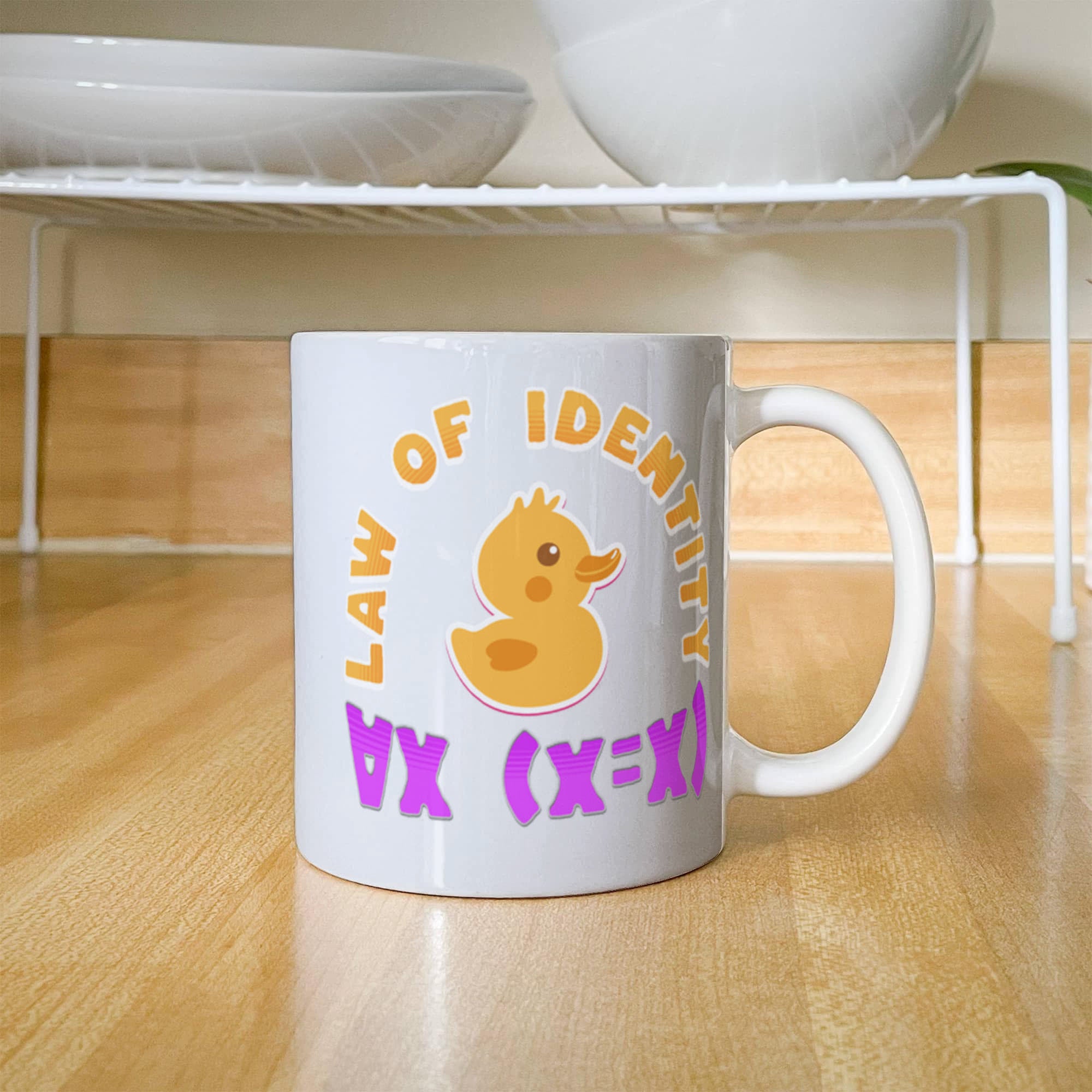 Law of Identity Duckie on a mug