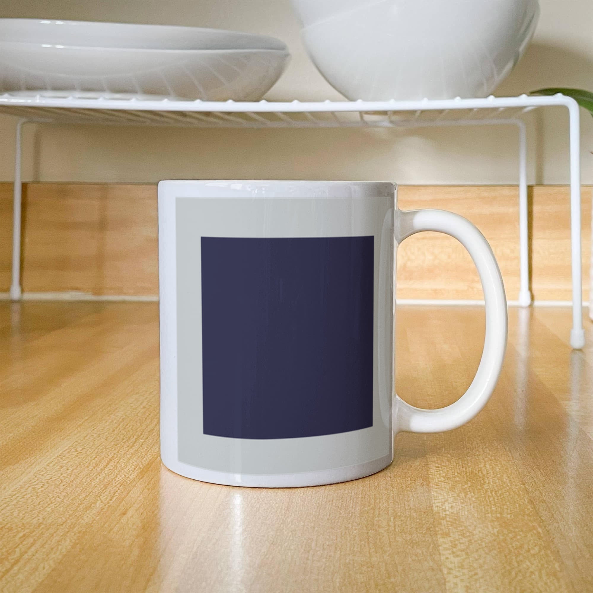 Black Suprematic Square (1915) on a white mug
