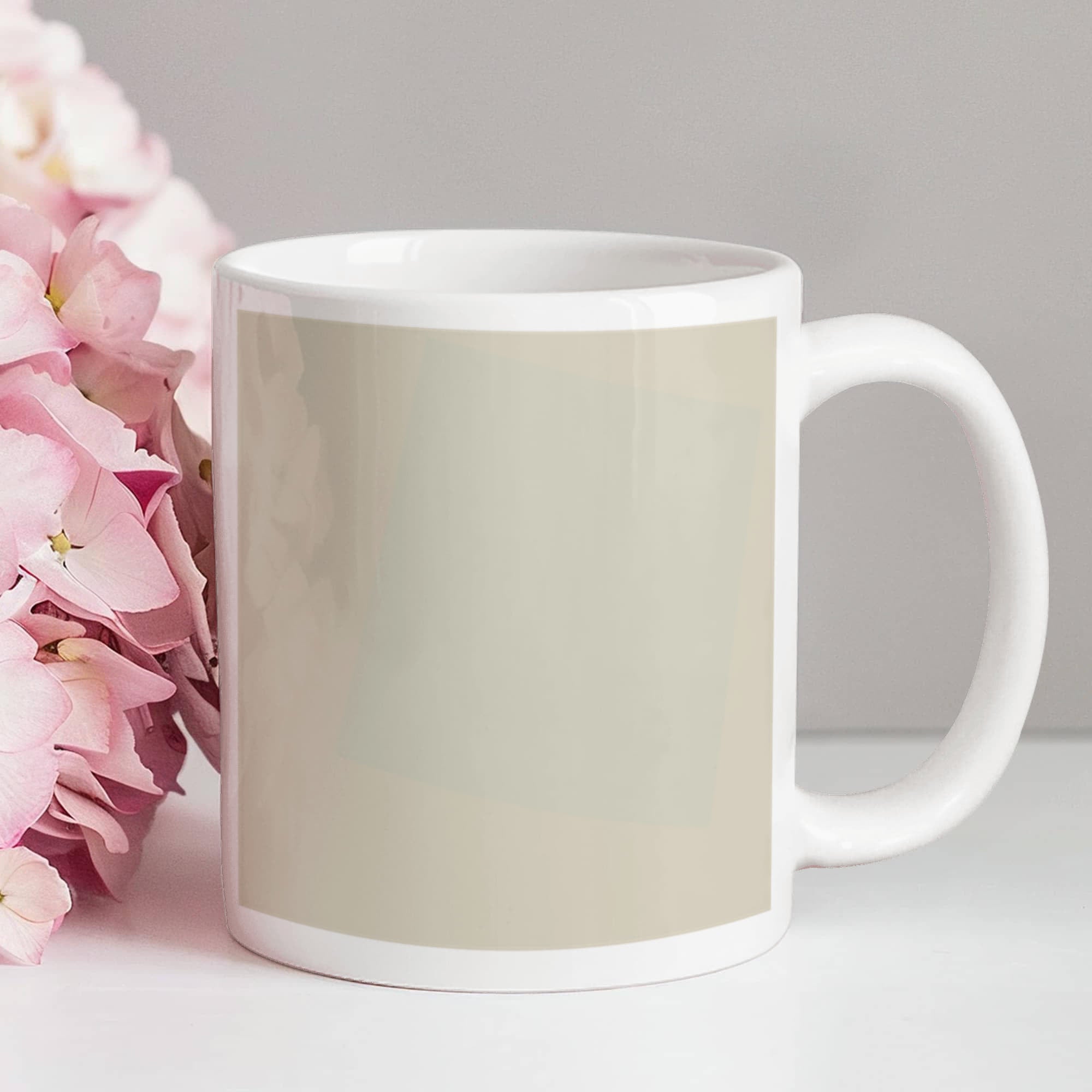 Suprematist Composition: White on White (1918) on a white mug