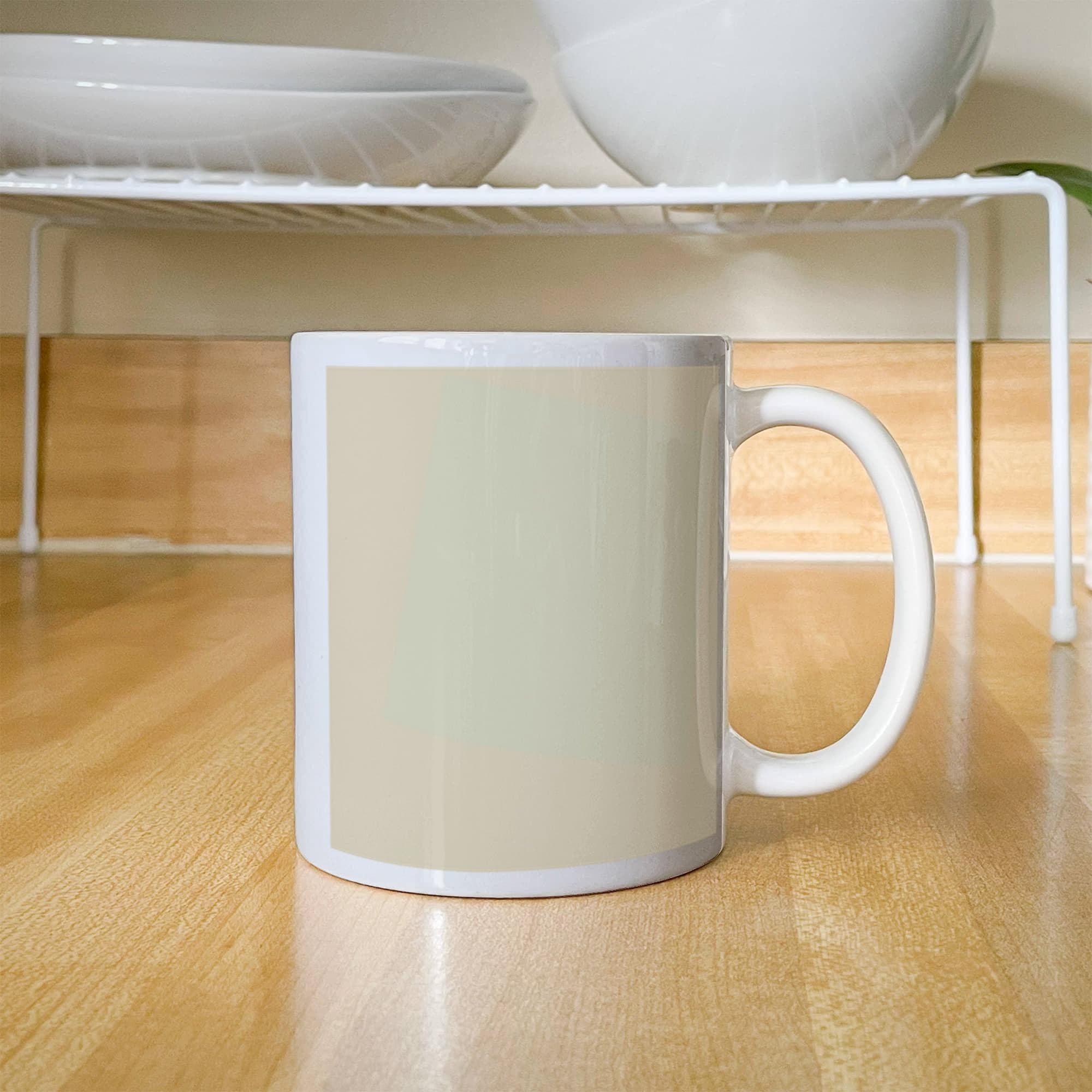 Suprematist Composition: White on White (1918) on a white mug