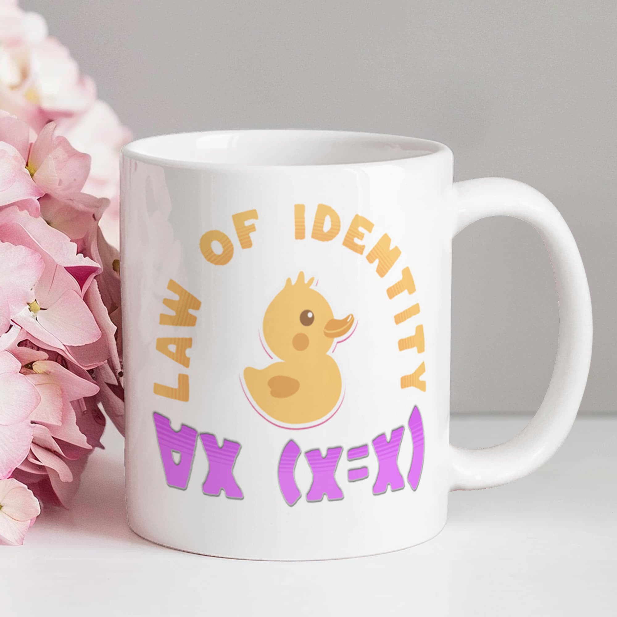 Law of Identity Duckie on a mug