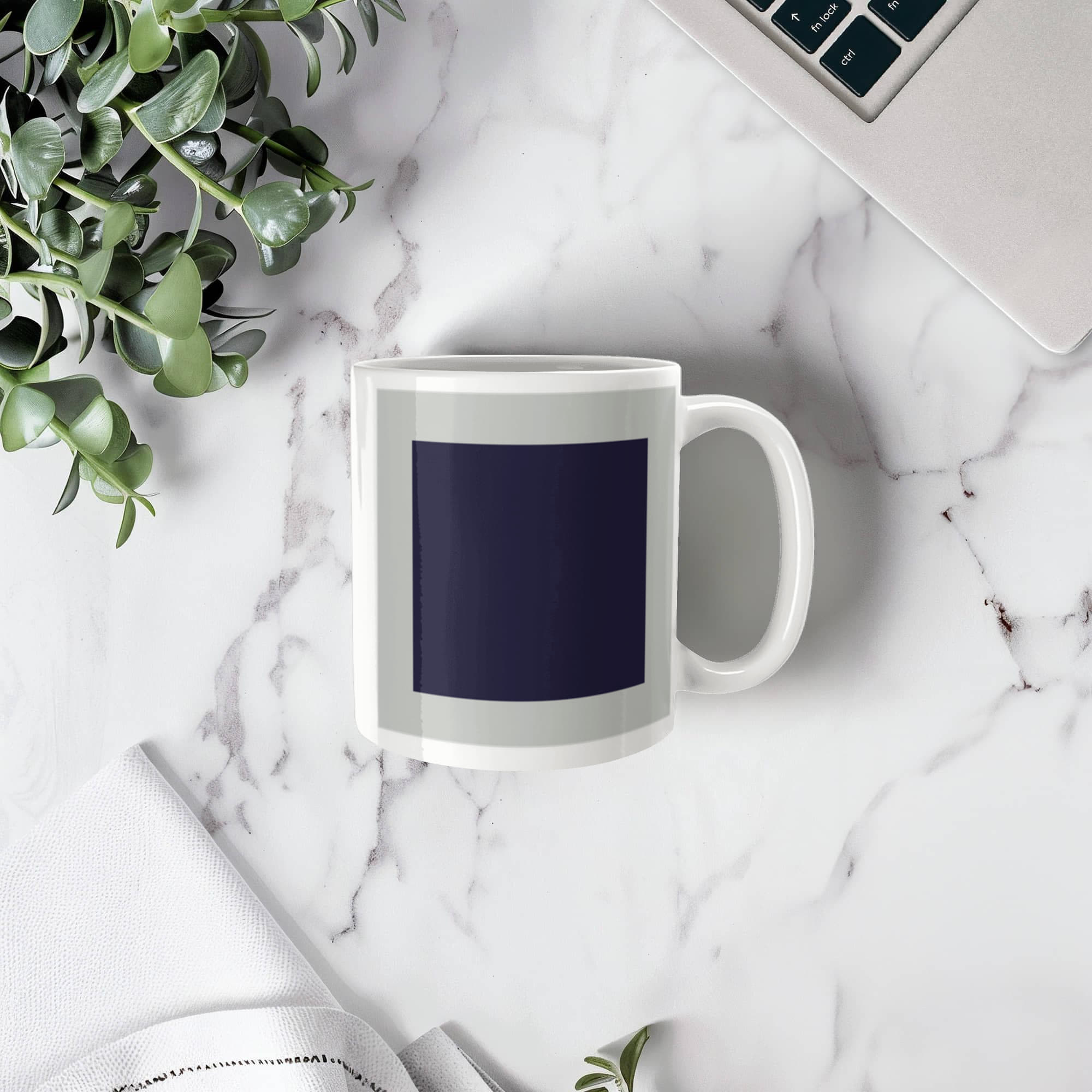 Black Suprematic Square (1915) on a white mug
