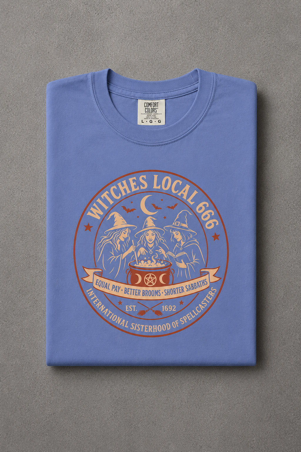 Witches Local 666 t-shirt — Mystic Blue colorway, folded flat lay